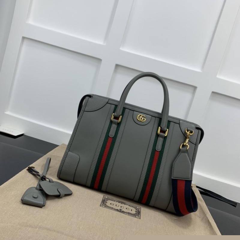 G*u*i top handle bags